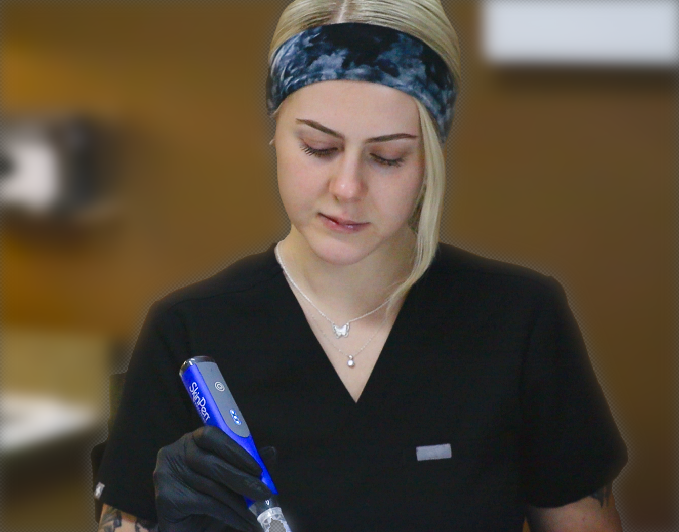 Gracen performing a SkinPen microneedling treatment